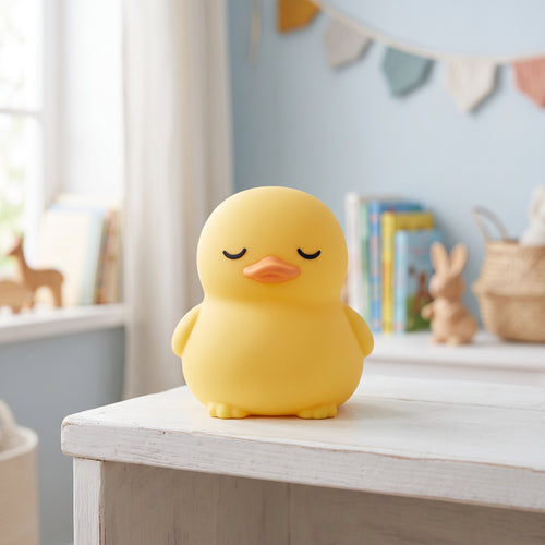 Coco le Canard, veilleuse canard en silicone éteinte en plein jour dans une chambre d'enfant – Milo & Lua